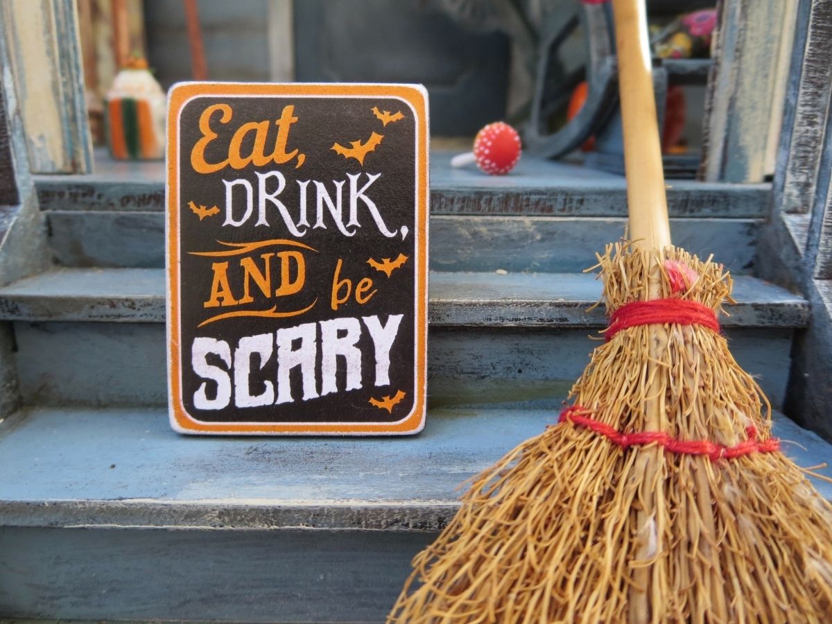 Eat, drink, and be scary sign.