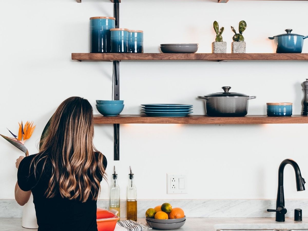 Woman organizing the kitchen