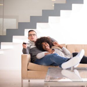 Couple relaxing in a clean home.